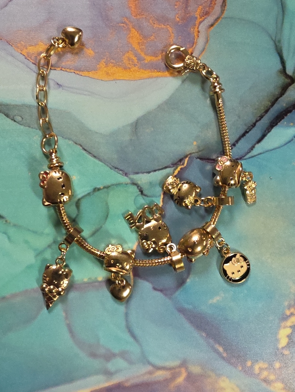 Hello Kitty Gold Charm Bracelet with Multiple Character Charms